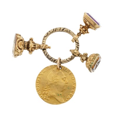 Lot 20 - A Georgian split ring, with 1788 Spade Guinea coin and three intaglio seal fobs