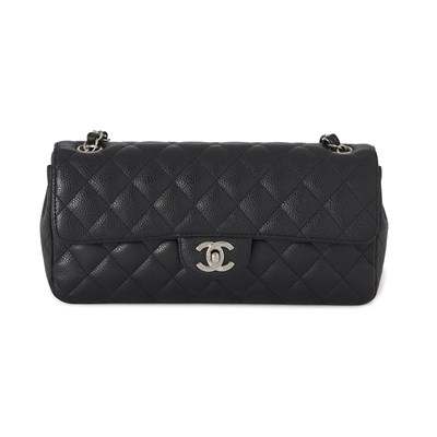 Lot 319 - Chanel, a black caviar East West single flap handbag.