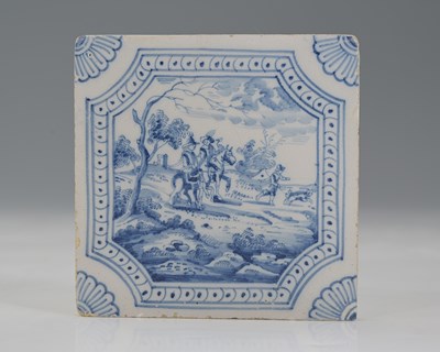 Lot 219 - An English Delft blue and white tile,...