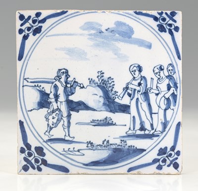 Lot 221 - An English Delft blue and white tile, London...