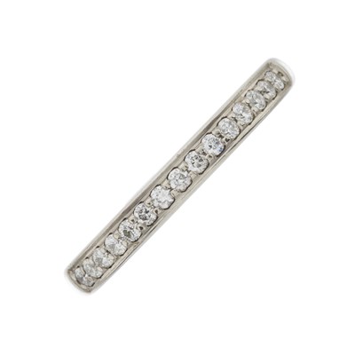 Lot 81 - A platinum diamond half eternity ring