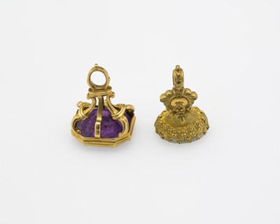 Lot 7 - Two intaglio engraved gem set gold coloured...