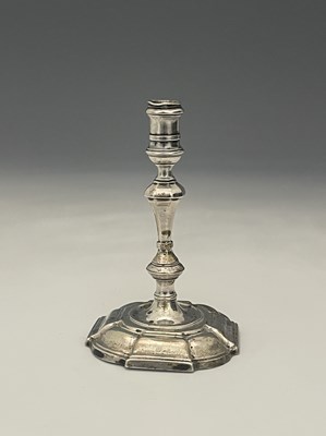 Lot 130 - A George II silver cast taperstick, sponsor's...