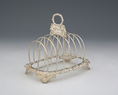 Lot 185 - A George IV Regency silver seven-bar toast...