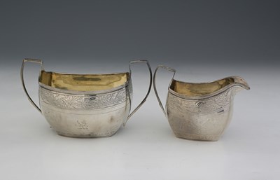 Lot 221 - A George III silver sugar bowl and milk jug,...