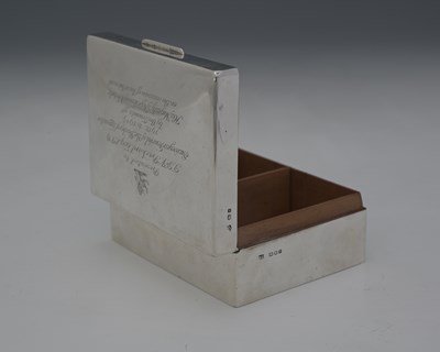 Lot 72 - A George VI silver cigarette box, by William...