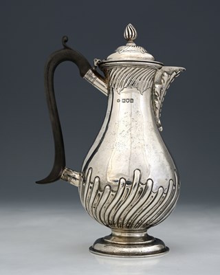 Lot 251 - An Edwardian silver hot water jug, by William...
