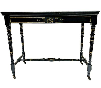 Lot 502 - An Aesthetic Movement games table, circa 1880,...