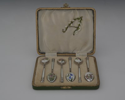 Lot 91 - A set of six silver and enamel coffee spoons,...