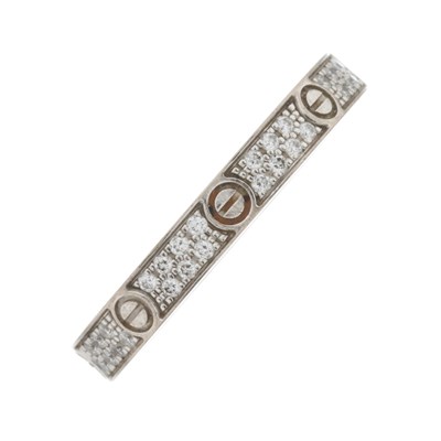 Lot 50 - Cartier, an 18ct gold pave-set diamond Love band ring