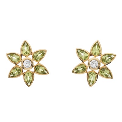 Lot 143 - A pair of 18ct gold peridot and diamond floral cluster earrings