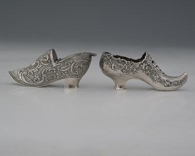 Lot 106 - Two Dutch silver novelty miniature shoes, the...