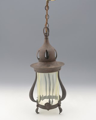 Lot 159 - An Arts and Crafts patinated metal pendant...