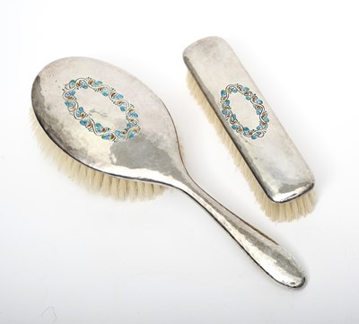 Lot 505 - A pair of Liberty & Co silver and enamel hair...