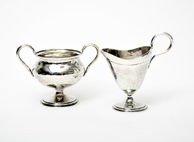 Lot 517 - An Omar Ramsden silver milk-jug and...