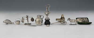 Lot 157 - A group of novelty miniatures, to include an...