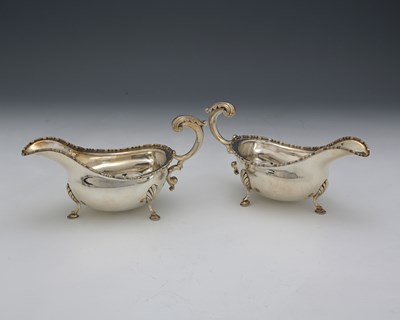 Lot 264 - A pair of Elizabeth II silver sauce boats, by...