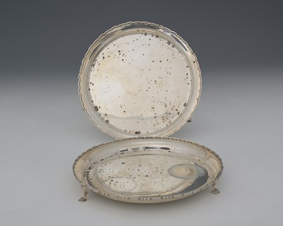 Lot 281 - A pair of Elizabeth II silver waiters or small...