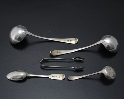 Lot 139 - A pair of George III old English pattern sauce...