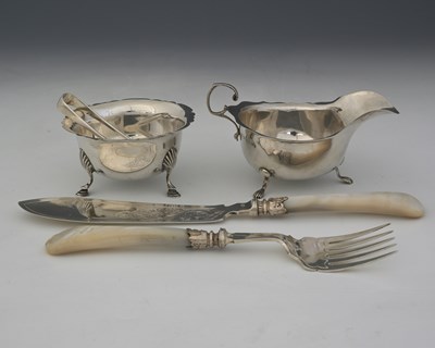 Lot 202 - A Victorian silver fish serving knife and fork,...