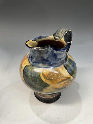 Lot 274 - A glazed studio pottery jug, baluster form,...