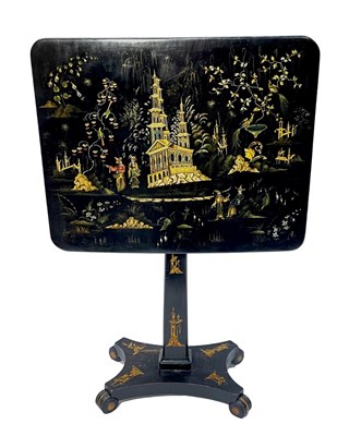 Lot 945 - A Regency black lacquer pedestal table, circa...