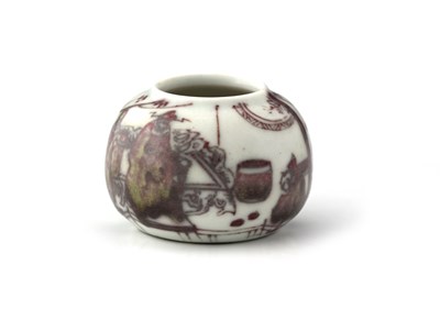 Lot 427 - A Chinese puce and copper red decorated bird...