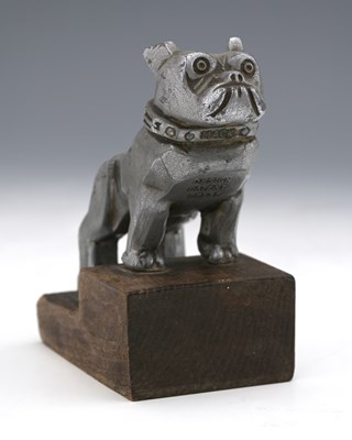 Lot 175 - Mack Trucks, an Art Deco figural bookend, cast...