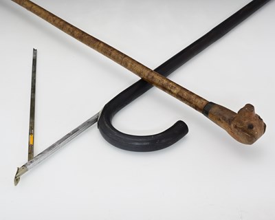 Lot 197 - An ebonised bamboo horse measuring stick,...