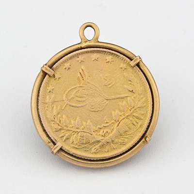 Lot 22 - An Ottoman Empire 100 Kurush coin, in a...