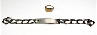 Lot 677 - A 9ct gold signet ring and a silver identity bracelet