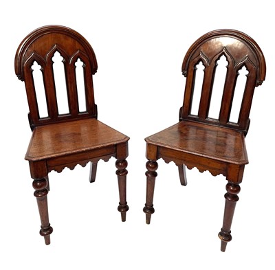 Lot 499 - A pair of mid-Victorian mahogany hall chairs,...