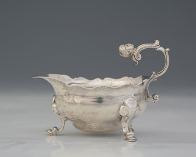 Lot 300 - A George II silver cream boat, sponsor's mark...