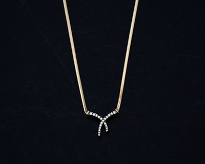 Lot 12 - A 9ct gold diamond necklace