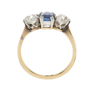 Lot 87 - A mid 20th century 18ct gold sapphire and old-cut diamond three-stone ring