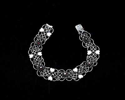 Lot 39 - A Secessionist silver and gem set bracelet,...