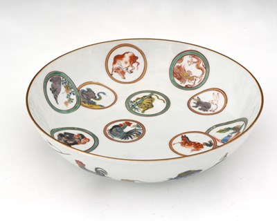 Lot 304 - An Oriental Zodiac dish, deep sided, enamelled...