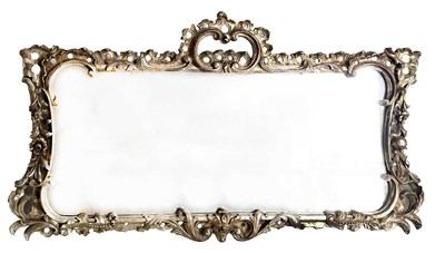Lot 494 - A carved wood overmantel of Rococo design,...