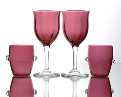 Lot 542 - A pair of Arts and Crafts Stourbridge armorial...