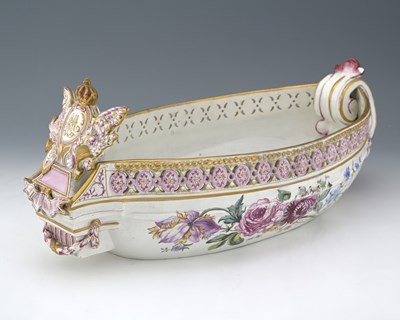 Lot 625 - A large Continental faience painted barge form...