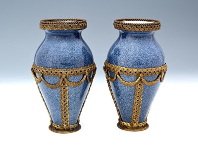 Lot 635 - A pair of Continental gilt metal mounted...