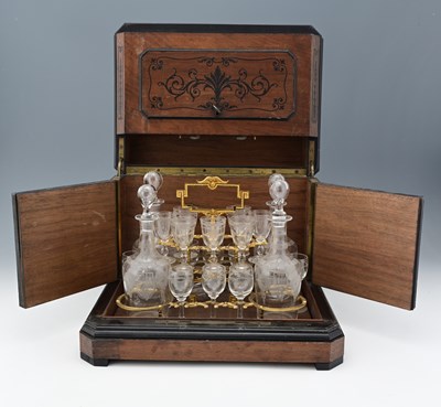 Lot 226 - A Continental walnut cased and ebony strung...