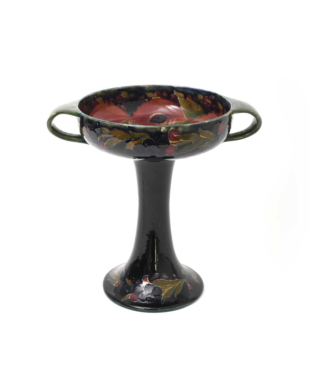 Lot 36 - 'Pomegranate' a Moorcroft Pottery twin-handled...