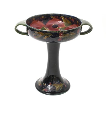 Lot 36 - 'Pomegranate' a Moorcroft Pottery twin-handled...