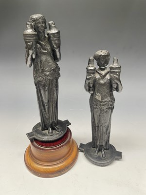 Lot 268 - A pair of bronze caryatid statuettes carrying...