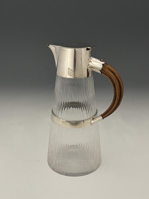 Lot 7 - Hukin and Heath, a silver-plated and 'hammered'...