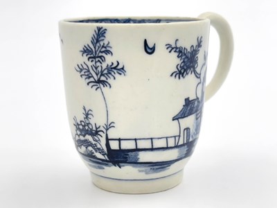 Lot 1002 - A Lowestoft Long Fence pattern coffee cup,...