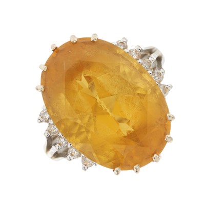 Lot 179 - An 18ct gold citrine and diamond cocktail ring