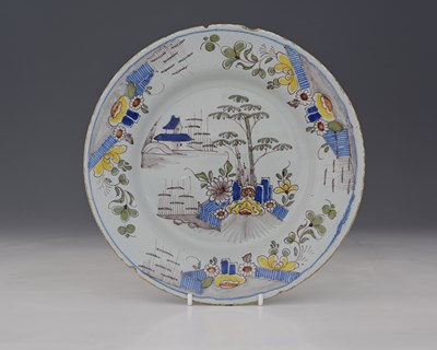 Lot 810 - A Bristol Delft polychrome plate, circa 1760,...