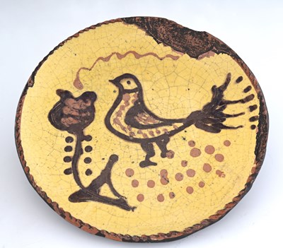 Lot 832 - A Staffordshire slipware dish, probably 18th...